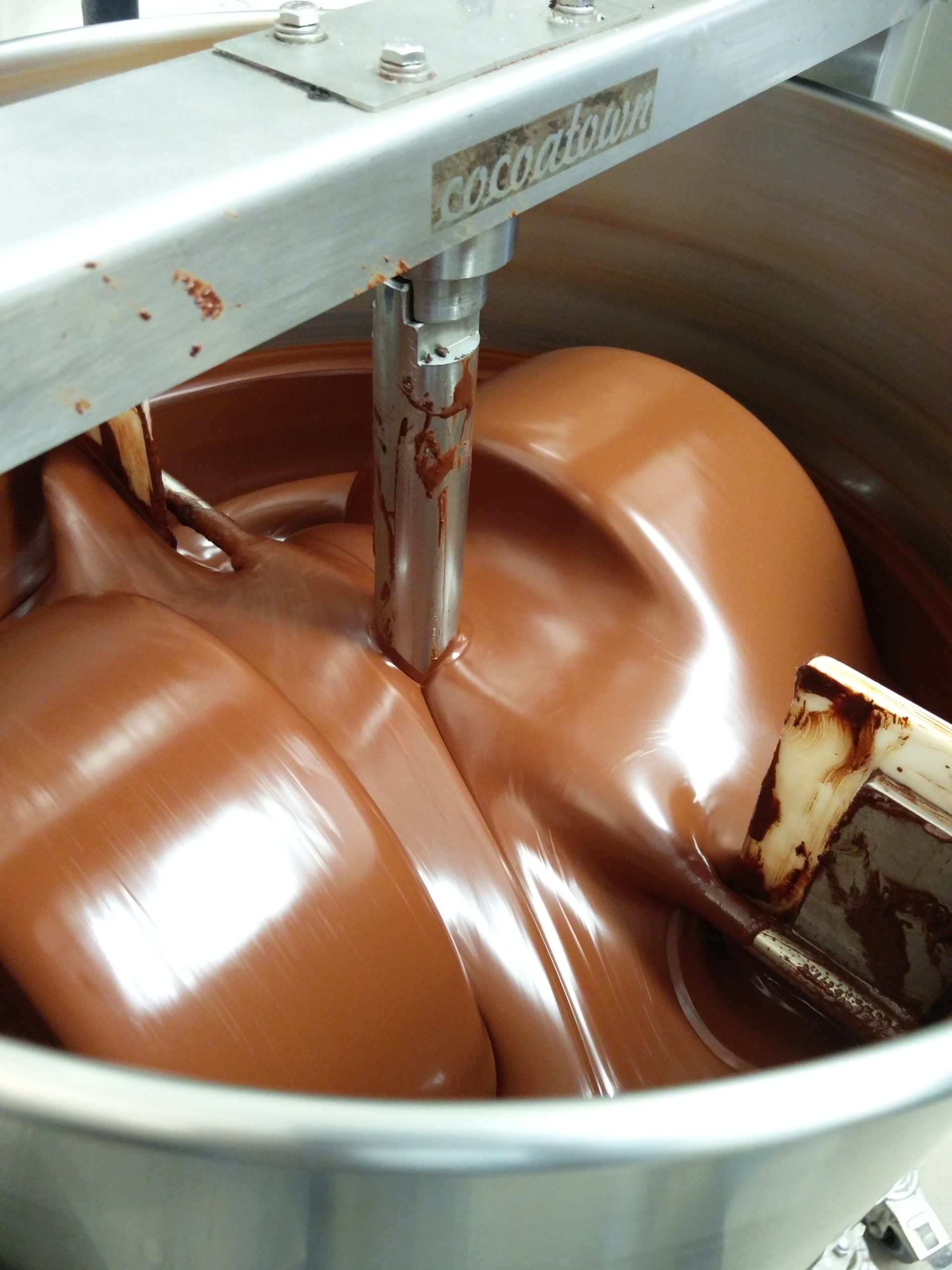 Melanger or melangeur mixing liquid chocolate