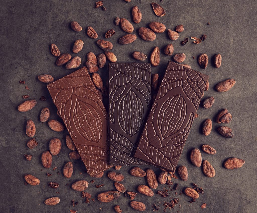 Vigdis Rosenkilde chocolate bar trio on cacao beans